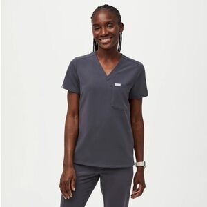 Like new.  Figs Catarina size medium scrub top in charcoal